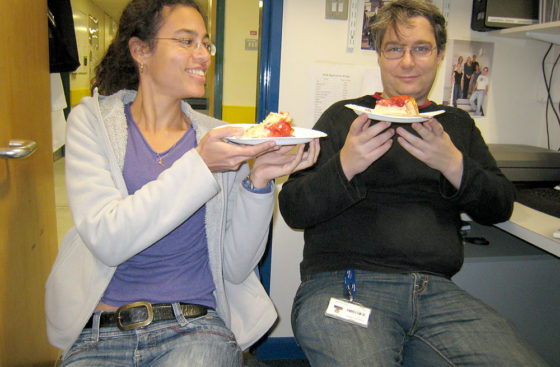 The fruits of their labour . . . Cécile Evrin and Juergen Speck size up their pieces of Christian's strawberry birthday cake.